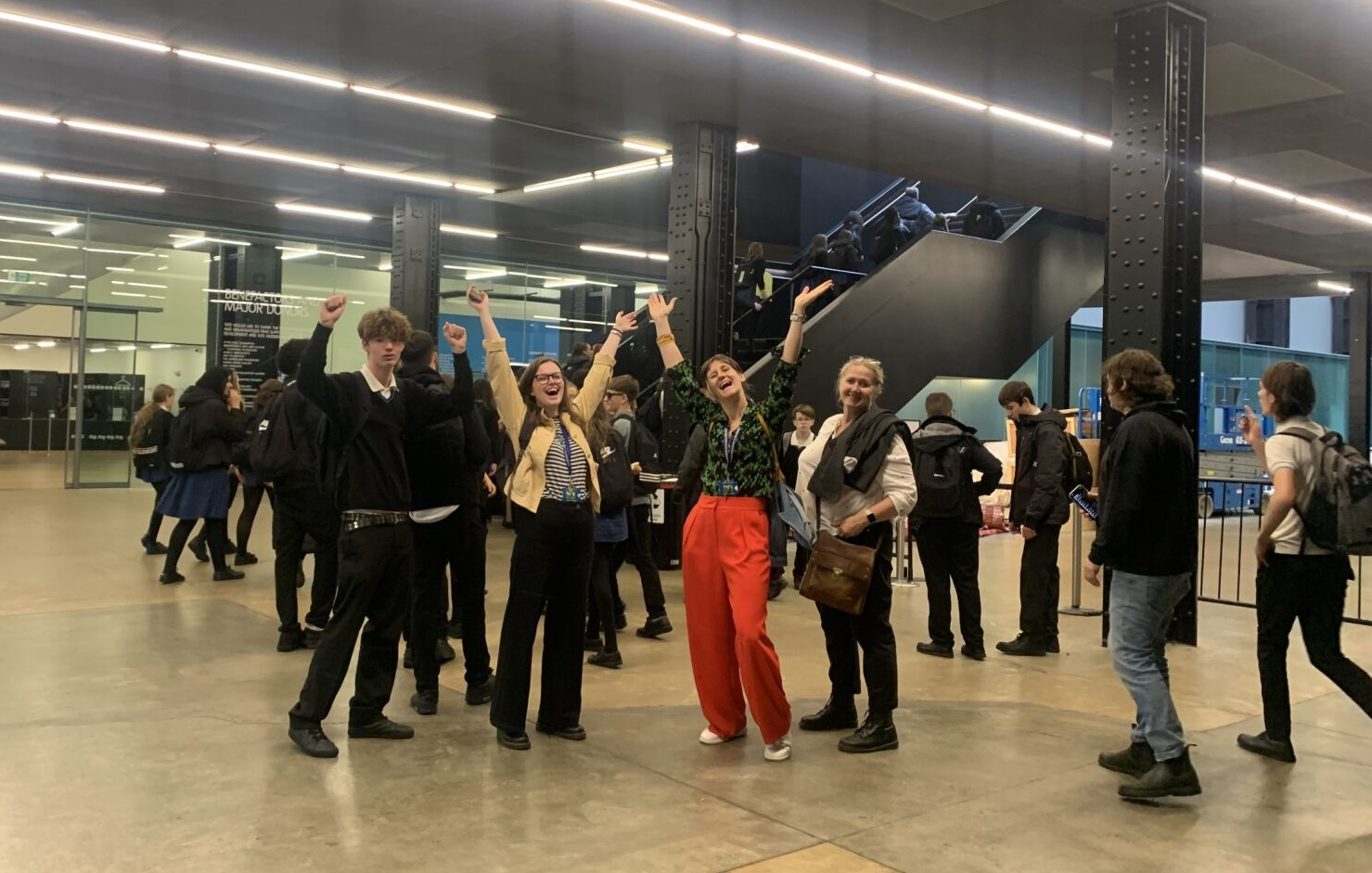 Denefield staff celebrating their arrival at the Tate